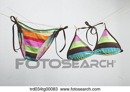 bikini hanging washing line View Large Photo Image Stock Image - bikini hanging washing line. Fotosearch