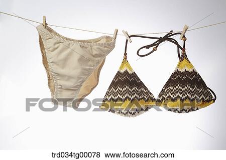 bikini hanging washing line View Large Photo Image Stock Photo - bikini hanging washing line. Fotosearch