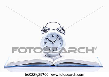 clock on the book View Large Photo Image Stock Image - clock on the book. Fotosearch