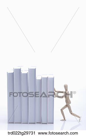 figurine push the books View Large Photo Image Stock Image - figurine push the books. Fotosearch
