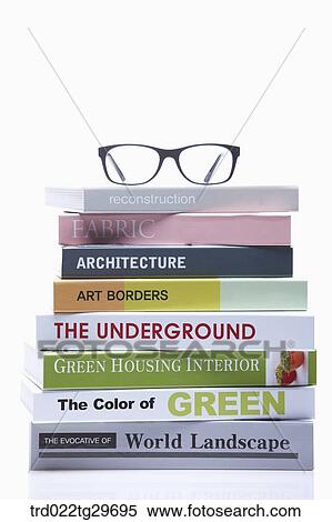 glasses on the piled books View Large Photo Image Stock Photography - glasses on the piled books. Fotosearch