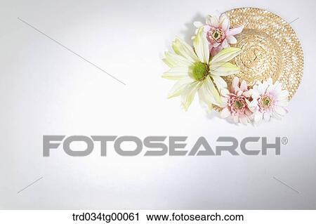 Stock Image - hat with flowers. Fotosearch