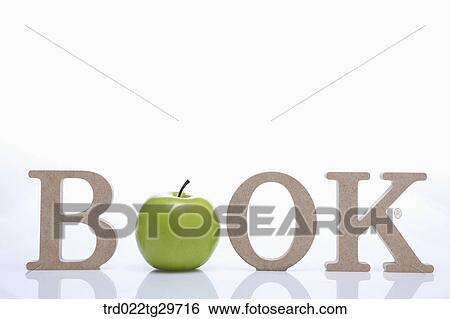 Stock Photograph - initials of book with apple. Fotosearch