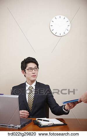 Stock Image - man gets the diary. Fotosearch
