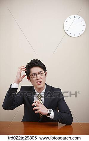 Stock Photography - man is frowning. Fotosearch