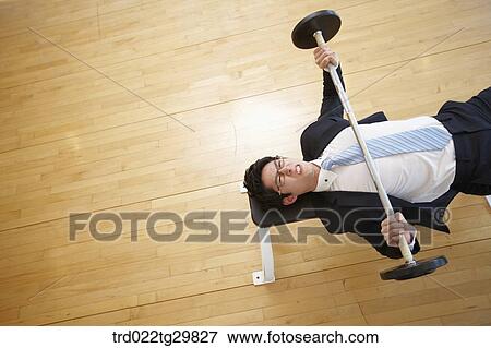 man lifts weights View Large Photo Image Stock Photo - man lifts weights. Fotosearch