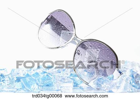 misty sunglasses on the ice cube View Large Photo Image Stock Photo - misty sunglasses on the ice cube. Fotosearch