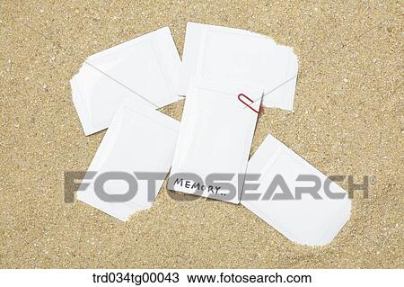 papers in the sand View Large Photo Image Stock Image - papers in the sand. Fotosearch
