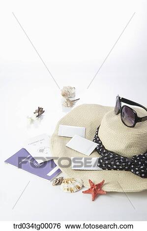 passport and hat with sunglasses View Large Photo Image Stock Photograph - passport and hat with sunglasses. Fotosearch