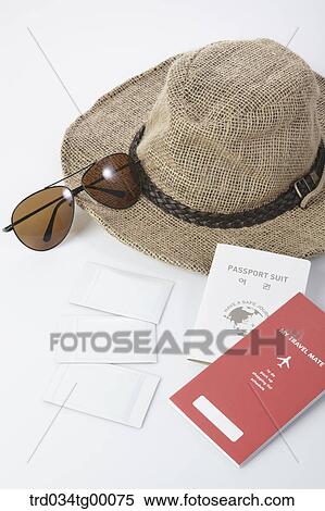 passport and hat with sunglasses View Large Photo Image Stock Photography - passport and hat with sunglasses. Fotosearch