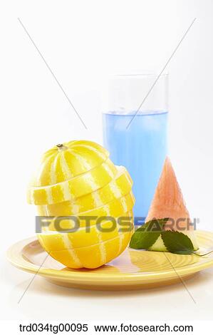 Stock Photography - sliced oriental melon and fruits. Fotosearch