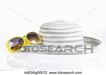 sunglasses and hat View Large Photo Image Stock Image - sunglasses and hat. Fotosearch