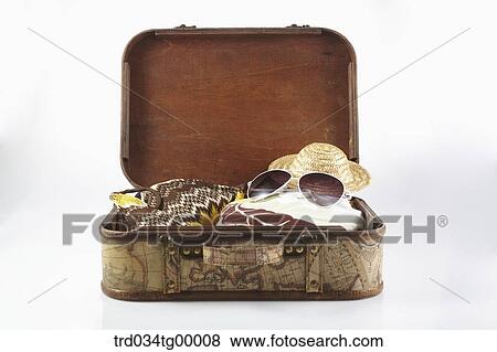 vacation items in luggage bag View Large Photo Image Stock Photo - vacation items in luggage bag. Fotosearch