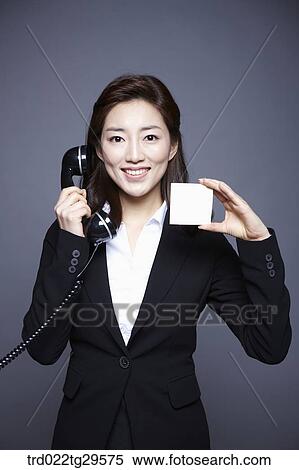 woman answering the phone View Large Photo Image Stock Photography - woman answering the phone. Fotosearch