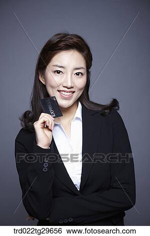 woman holding card View Large Photo Image Stock Photograph - woman holding card. Fotosearch