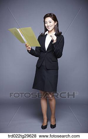woman holding files View Large Photo Image Stock Photo - woman holding files. Fotosearch