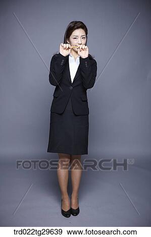 woman holding pencil View Large Photo Image Stock Photo - woman holding pencil. Fotosearch