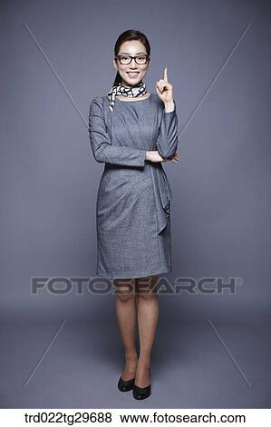 woman point at upward View Large Photo Image Stock Photo - woman point at upward. Fotosearch