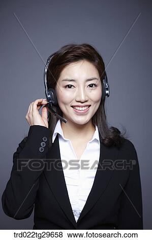 woman wearing headset View Large Photo Image Stock Photo - woman wearing headset. Fotosearch
