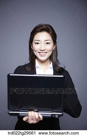 woman working by using laptop View Large Photo Image Stock Image - woman working by using laptop. Fotosearch