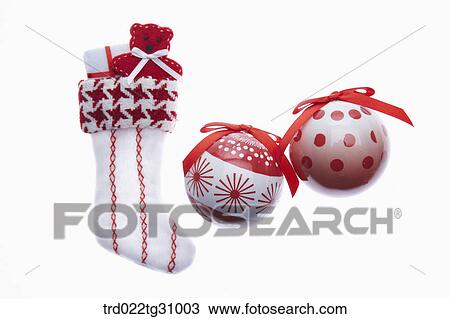The Christmas stocking with red and white Christmas ball decorations View Large Photo Image Stock Image - The Christmas stocking with red and white Christmas ball decorations. Fotosearch