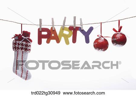 The colorful party word, red Christmas balls, and Christmas stocking hung upon the red string View Large Photo Image Stock Photo - The colorful party word, red Christmas balls, and Christmas stocking hung upon the red string. Fotosearch