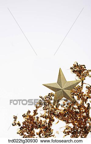 The gold star with gold glittering decoration View Large Photo Image Stock Image - The gold star with gold glittering decoration. Fotosearch