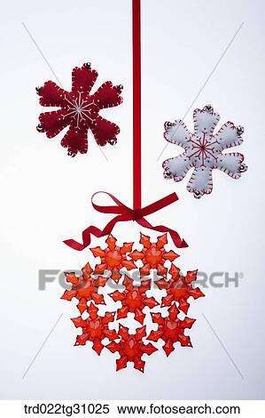 The red crystal snowflakes and red ribboned tie with snowflake patch works View Large Photo Image Stock Photography - The red crystal snowflakes and red ribboned tie with snowflake patch works. Fotosearch