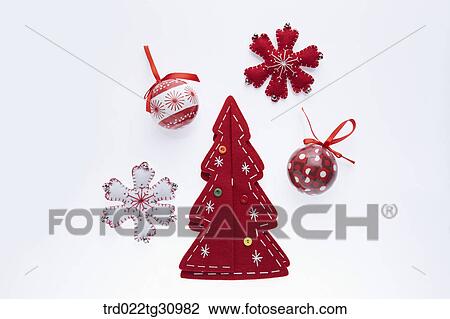 The red tree with red, white snowflake and red Christmas balls around View Large Photo Image Stock Image - The red tree with red, white snowflake and red Christmas balls around. Fotosearch