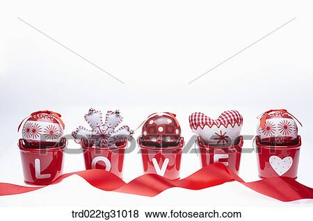 The red, white Christmas patchworks and ball in red love basket with red tie View Large Photo Image Stock Photo - The red, white Christmas patchworks and ball in red love basket with red tie. Fotosearch