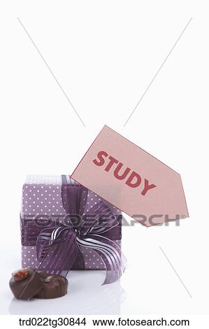 Picture - A box of chocolate and a study message. Fotosearch