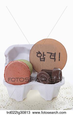 Stock Image - A box of sweets and a message. Fotosearch