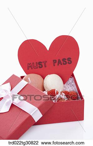 A box of sweets and a MUST PASS message View Large Photo Image Stock Image - A box of sweets and a MUST PASS message. Fotosearch
