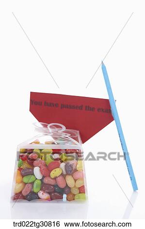 A packet of jelly beans and a message View Large Photo Image Stock Photograph - A packet of jelly beans and a message. Fotosearch