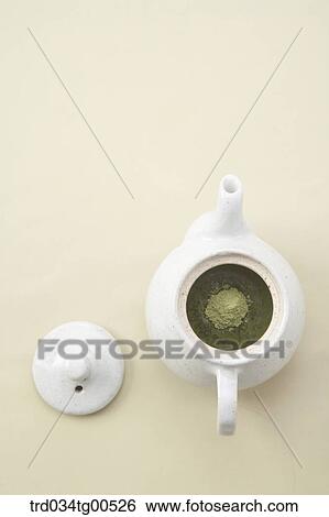 A tea pot of green tea powder View Large Photo Image Stock Photograph - A tea pot of green tea powder. Fotosearch