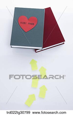 Arrows toward books with a MUST PASS message View Large Photo Image Stock Photo - Arrows toward books with a MUST PASS message. Fotosearch