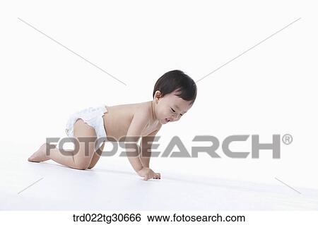 Baby boy in nappy crawling View Large Photo Image Stock Photograph - Baby boy in nappy crawling. Fotosearch
