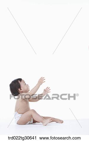 Baby boy in nappy View Large Photo Image Stock Image - Baby boy in nappy. Fotosearch