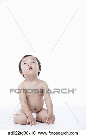 Stock Image - Baby boy in nappy. Fotosearch