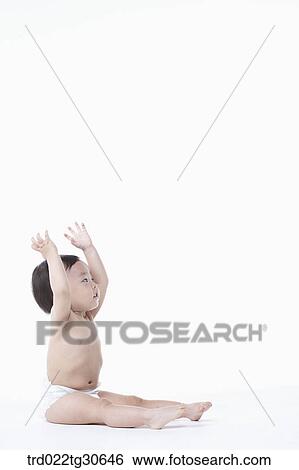 Baby boy in nappy View Large Photo Image Stock Photograph - Baby boy in nappy. Fotosearch