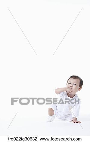 Baby boy in white clothes View Large Photo Image Stock Image - Baby boy in white clothes. Fotosearch