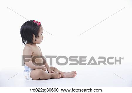 Baby girl in nappy crawling View Large Photo Image Stock Image - Baby girl in nappy crawling. Fotosearch