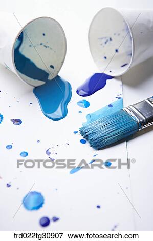 Blue paints splattered on a paper and a brush View Large Photo Image Stock Photo - Blue paints splattered on a paper and a brush. Fotosearch