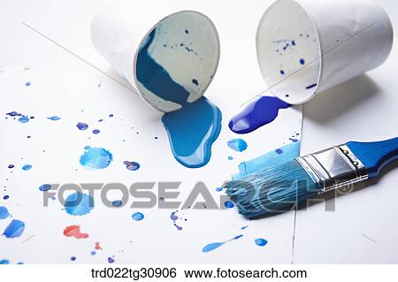 Blue paints splattered on a paper and a brush View Large Photo Image Stock Photograph - Blue paints splattered on a paper and a brush. Fotosearch