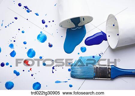 Blue paints splattered on a paper and a brush View Large Photo Image Stock Photography - Blue paints splattered on a paper and a brush. Fotosearch