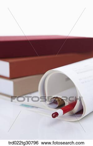Books and a red color pencil View Large Photo Image Stock Photograph - Books and a red color pencil. Fotosearch