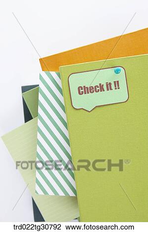 Stock Image - Books and Check it!! message. Fotosearch
