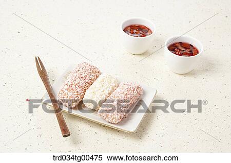 Cups of date tea and a plate of Korean traiditional sweets View Large Photo Image Stock Photography - Cups of date tea and a plate of Korean traiditional sweets. Fotosearch