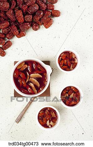 Cups of date tea and dates View Large Photo Image Stock Image - Cups of date tea and dates. Fotosearch