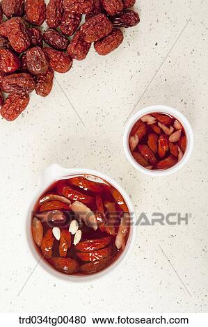 Stock Image - Cups of date tea and dates. Fotosearch